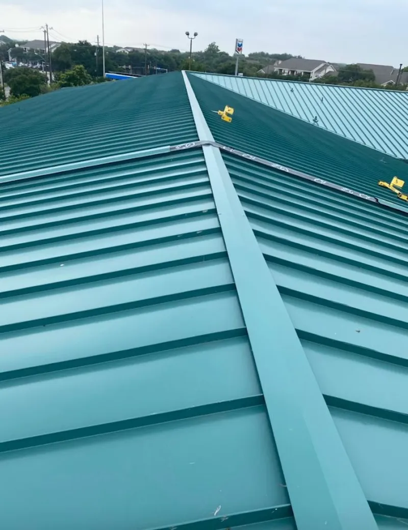 Green commercial metal roof ridge and valley for Metal Roof Repair in Carrollwood